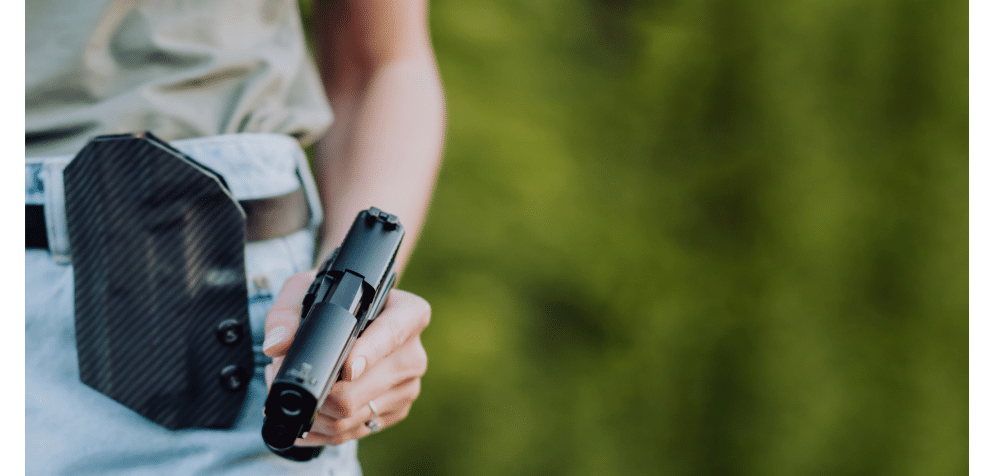 Woman holding a handgun
