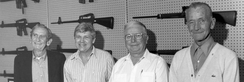 Gene Stoner (center right) at an ArmaLite reunion organized by Reed Knight (center left) for Stoner's 70th anniversary. Bill Mullens (left) was the chief marketing agent, and Tom Tellefson (right