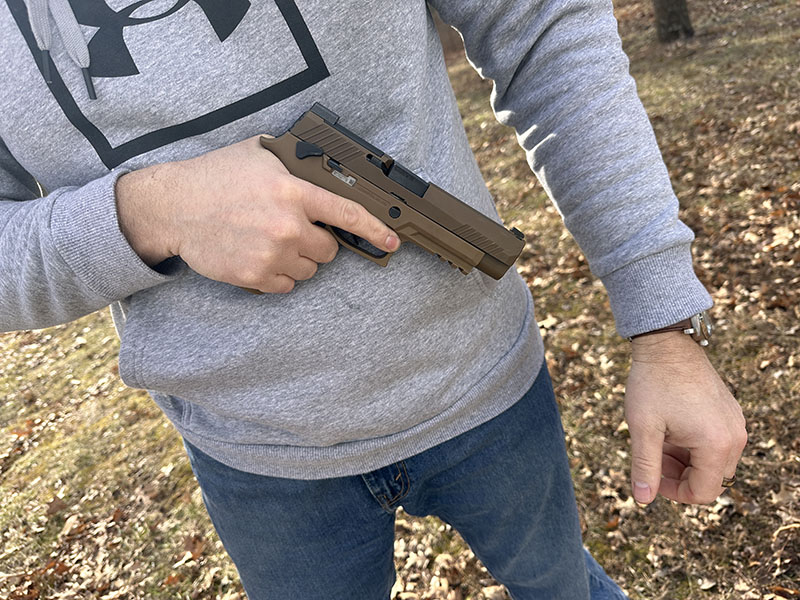 Carrying the SIG P320 M17 shows its size. 